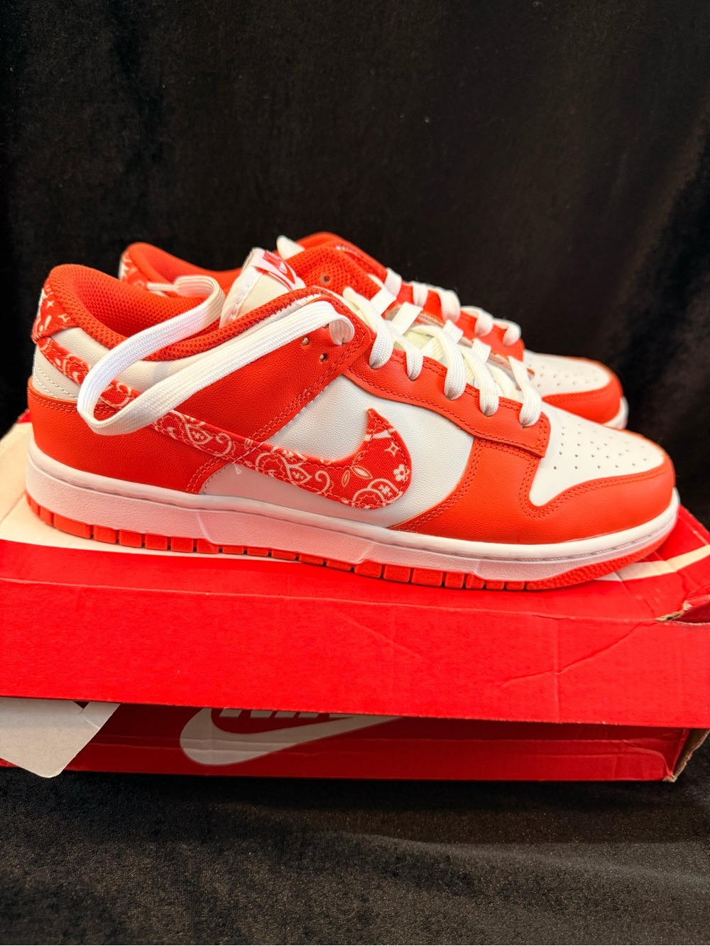Nike  Orange and White Low-Top Sneakers with Patterned Swoosh
